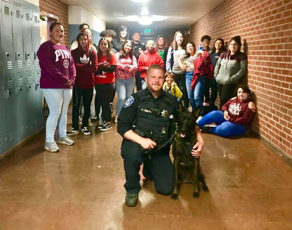 Antioch Police officer Kyle Smith with Antioch High School Students